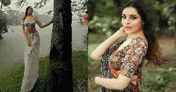 সাদা পোশাকে বৃষ্টিতে ভিজে ঝড় তোলা কে এই স্নিগ্ধা?