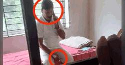 সিগারেট হাতে মোবাইল নিয়ে হাজতে কথা বলছেন বিএনপির সাবেক নেতা